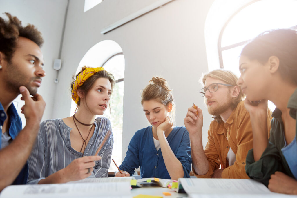 A marketing team brainstorming about face-to-face marketing.